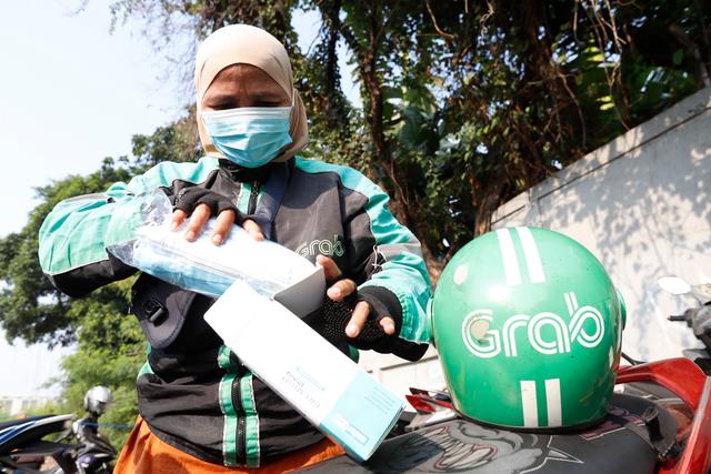 Jakarta Polusi, Grab Bagi-bagi 125 Ribu Masker ke Mitra dan Penumpang