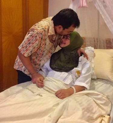 Wanita Berhijab Ini Penyebar Foto Bayi Siti Nurhaliza